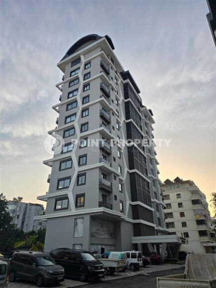 Современная квартира 50 м² в комплексе с инфраструктурой в Махмутларе-id-9897-фото-27