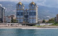 2+1 apartment with direct sea view in an ultra-modern complex on the first coastline in Mahmutlar-id-9898-photo-1