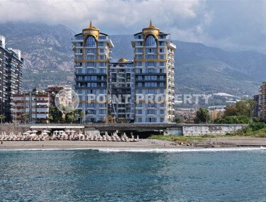 2+1 apartment with direct sea view in an ultra-modern complex on the first coastline in Mahmutlar-id-9898-photo-1