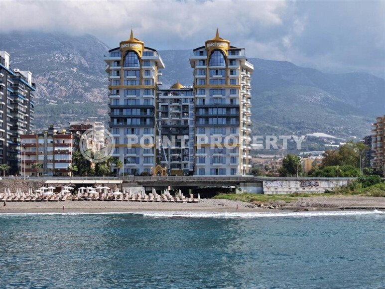 2+1 apartment with direct sea view in an ultra-modern complex on the first coastline in Mahmutlar-id-9898-photo-1