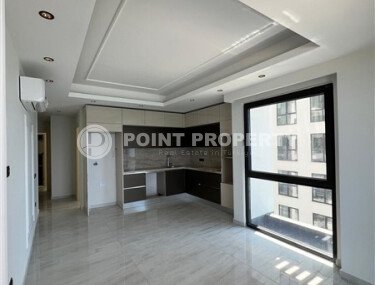 Квартира 2+1 с прямым видом на море в ультрасовременном комплексе на первой береговой линии в Махмутларе-id-9898-фото-3