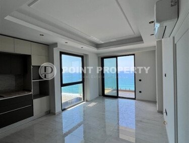 Квартира 2+1 с прямым видом на море в ультрасовременном комплексе на первой береговой линии в Махмутларе-id-9898-фото-4