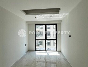 Квартира 2+1 с прямым видом на море в ультрасовременном комплексе на первой береговой линии в Махмутларе-id-9898-фото-5