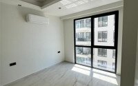 2+1 apartment with direct sea view in an ultra-modern complex on the first coastline in Mahmutlar-id-9898-photo-6