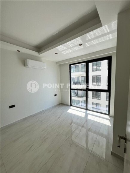 2+1 apartment with direct sea view in an ultra-modern complex on the first coastline in Mahmutlar-id-9898-photo-6