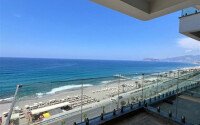 2+1 apartment with direct sea view in an ultra-modern complex on the first coastline in Mahmutlar-id-9898-photo-11