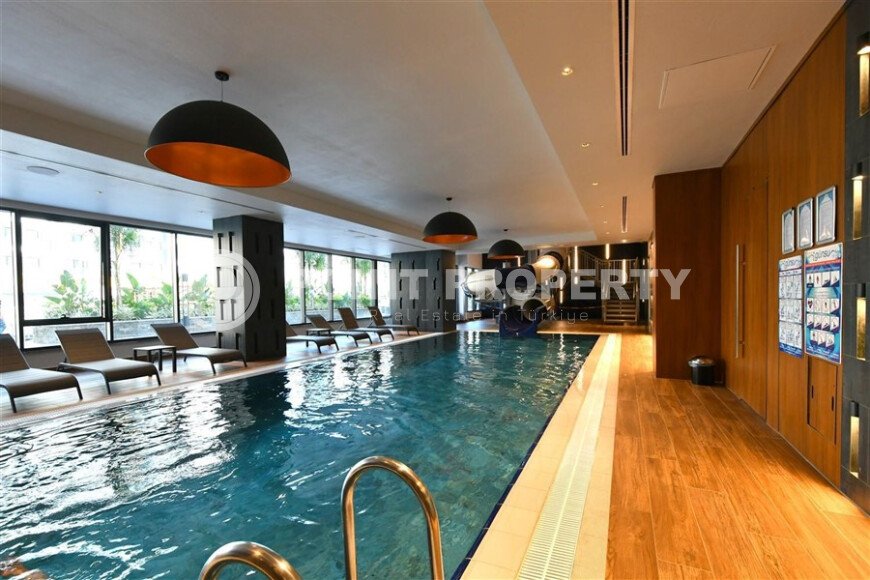 2+1 apartment with direct sea view in an ultra-modern complex on the first coastline in Mahmutlar-id-9898-photo-19