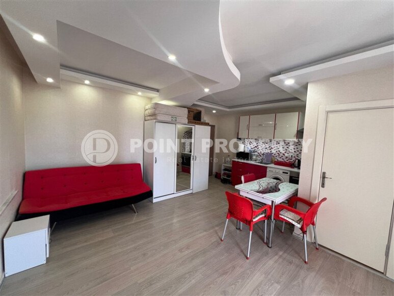 Квартира-студия с видом на море в комплексе на первой береговой линии в центре Махмутлара-id-9899-фото-3