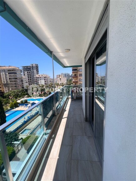 Квартира-студия с видом на море в комплексе на первой береговой линии в центре Махмутлара-id-9899-фото-18