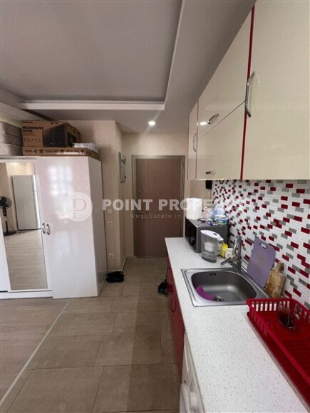 Квартира-студия с видом на море в комплексе на первой береговой линии в центре Махмутлара-id-9899-фото-22