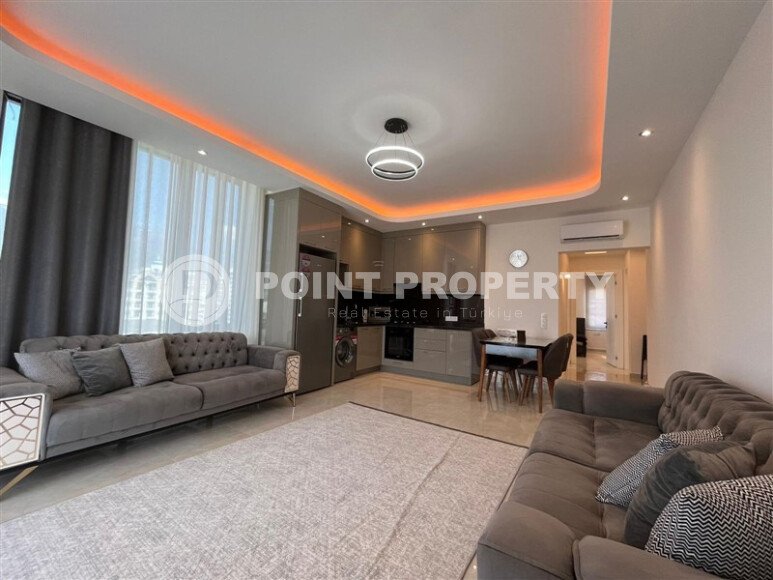 2+1 furnished apartment with mountain view in new complex 2024 in Mahmutlar-id-9904-photo-1