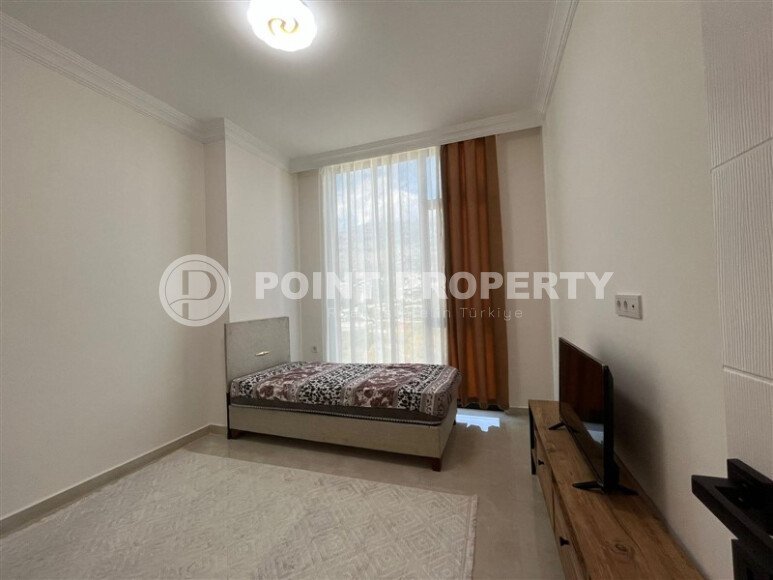 2+1 furnished apartment with mountain view in new complex 2024 in Mahmutlar-id-9904-photo-10