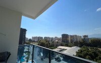 2+1 furnished apartment with mountain view in new complex 2024 in Mahmutlar-id-9904-photo-15