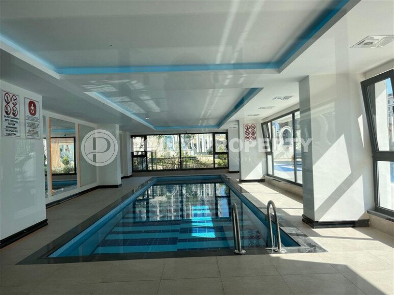 2+1 furnished apartment with mountain view in new complex 2024 in Mahmutlar-id-9904-photo-21