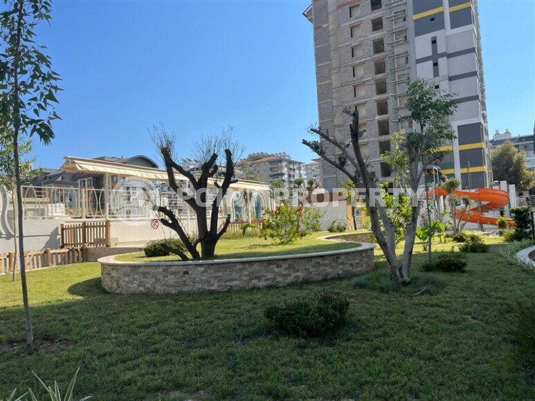 2+1 furnished apartment with mountain view in new complex 2024 in Mahmutlar-id-9904-photo-24