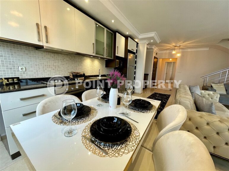 Просторный дуплекс 250 м² с тремя спальнями в Махмутларе-id-9905-фото-2