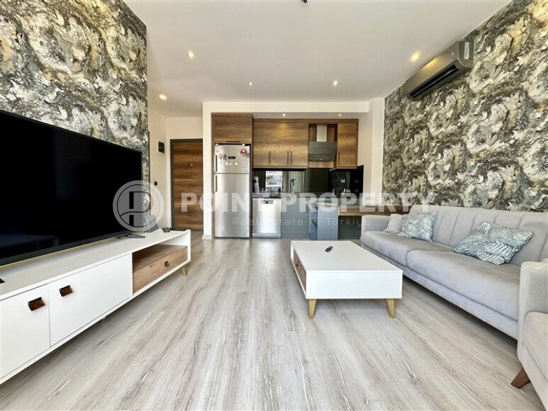 Urgent sale of a 1+1 apartment with furniture in a complex with hotel infrastructure in Mahmutlar-id-9906-photo-1