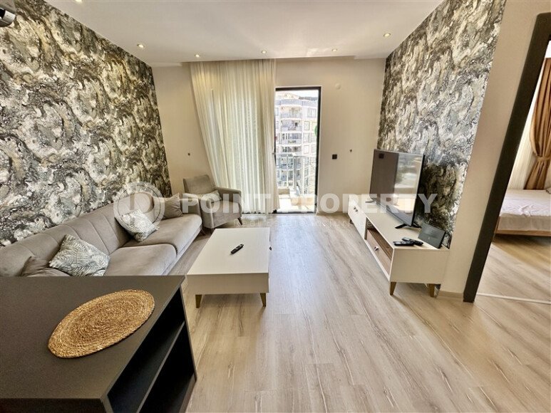 Срочная продажа квартиры 1+1 с мебелью в комплексе с отельной инфраструктурой в Махмутларе-id-9906-фото-2