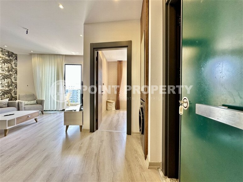 Срочная продажа квартиры 1+1 с мебелью в комплексе с отельной инфраструктурой в Махмутларе-id-9906-фото-4