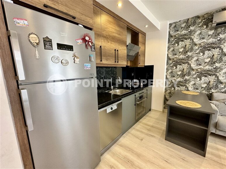 Срочная продажа квартиры 1+1 с мебелью в комплексе с отельной инфраструктурой в Махмутларе-id-9906-фото-7