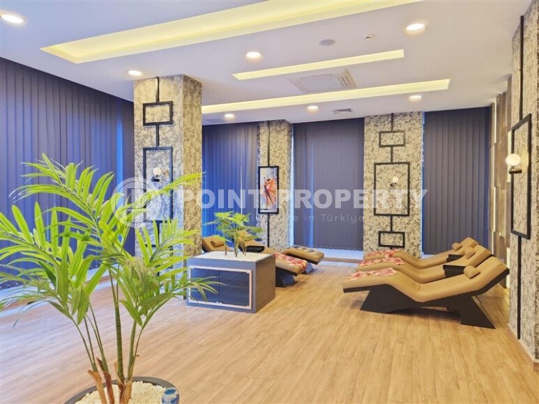 Срочная продажа квартиры 1+1 с мебелью в комплексе с отельной инфраструктурой в Махмутларе-id-9906-фото-14