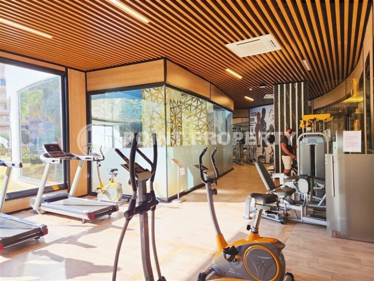 Срочная продажа квартиры 1+1 с мебелью в комплексе с отельной инфраструктурой в Махмутларе-id-9906-фото-15