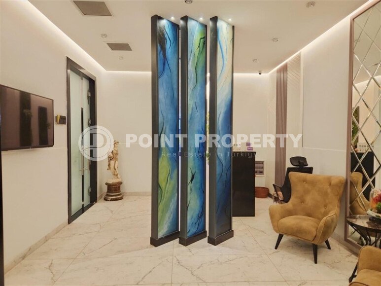 Срочная продажа квартиры 1+1 с мебелью в комплексе с отельной инфраструктурой в Махмутларе-id-9906-фото-19