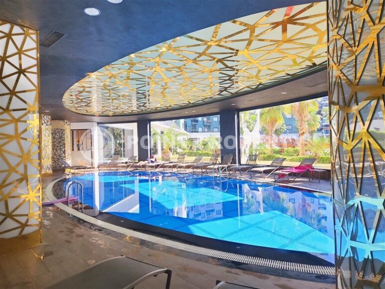 Срочная продажа квартиры 1+1 с мебелью в комплексе с отельной инфраструктурой в Махмутларе-id-9906-фото-20