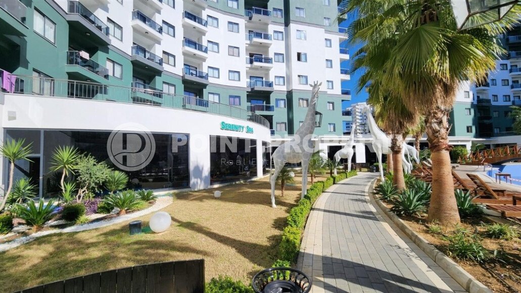 Срочная продажа квартиры 1+1 с мебелью в комплексе с отельной инфраструктурой в Махмутларе-id-9906-фото-23