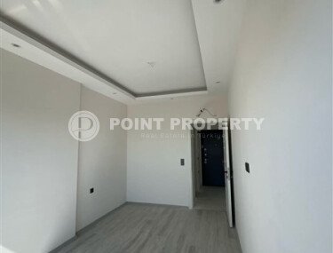 Срочная продажа новой квартиры 1+1 в комплексе с инфраструктурой отельного типа в Махмутларе-id-9907-фото-4