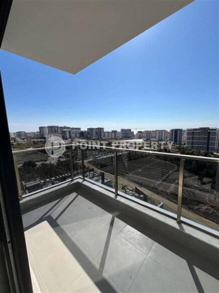 Срочная продажа новой квартиры 1+1 в комплексе с инфраструктурой отельного типа в Махмутларе-id-9907-фото-8