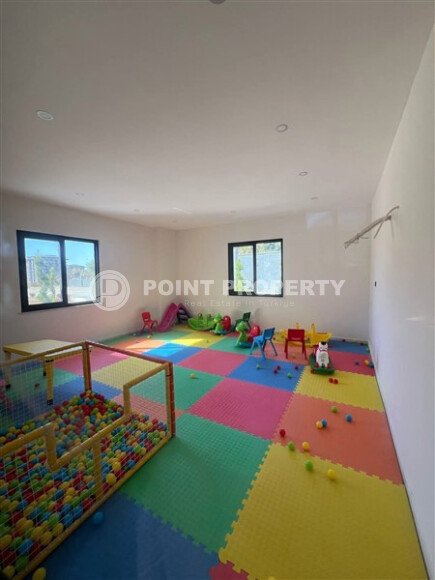 Срочная продажа новой квартиры 1+1 в комплексе с инфраструктурой отельного типа в Махмутларе-id-9907-фото-11