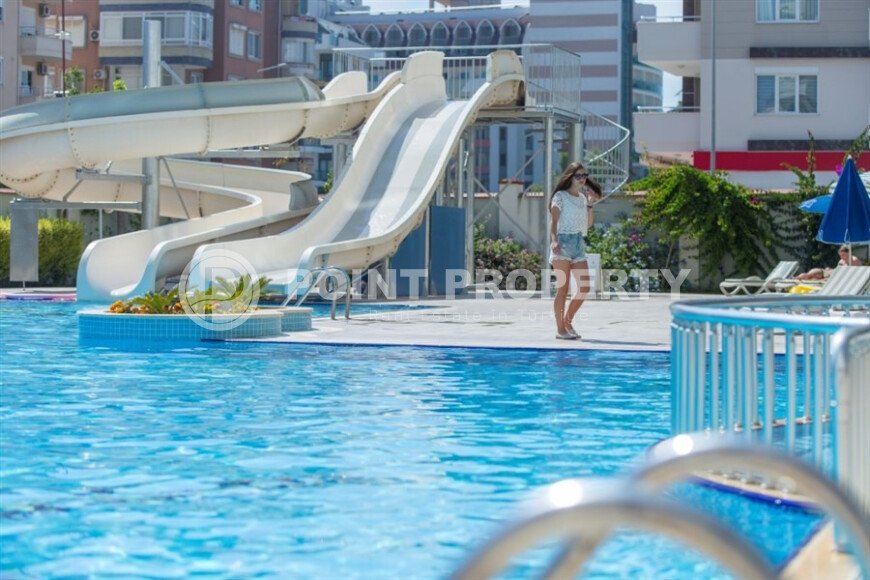 Spacious 2+1 with an area of 115 m² in Tosmur – a large complex near the sea, residence permit-id-9910-photo-1