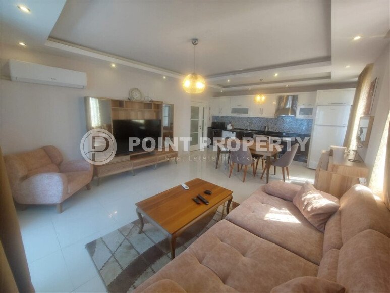 Район Махмутлар. Квартира 2+1, 115 м², 2015 года, до моря 800 м, до центра 500 м, меблирована, с двумя балконами и видом на бассейн.-id-9913-фото-2