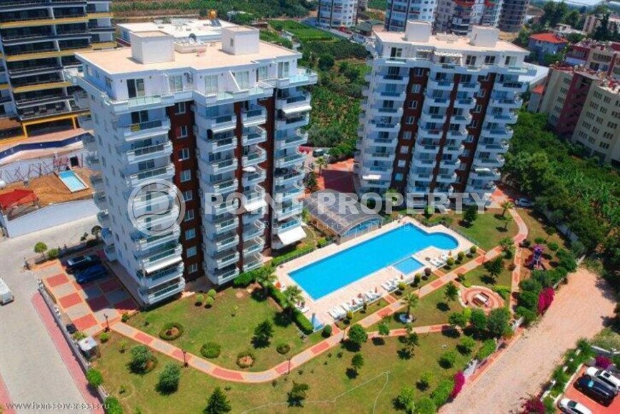 Район Махмутлар. Квартира 2+1, 115 м², 2015 года, до моря 800 м, до центра 500 м, меблирована, с двумя балконами и видом на бассейн.-id-9913-фото-3