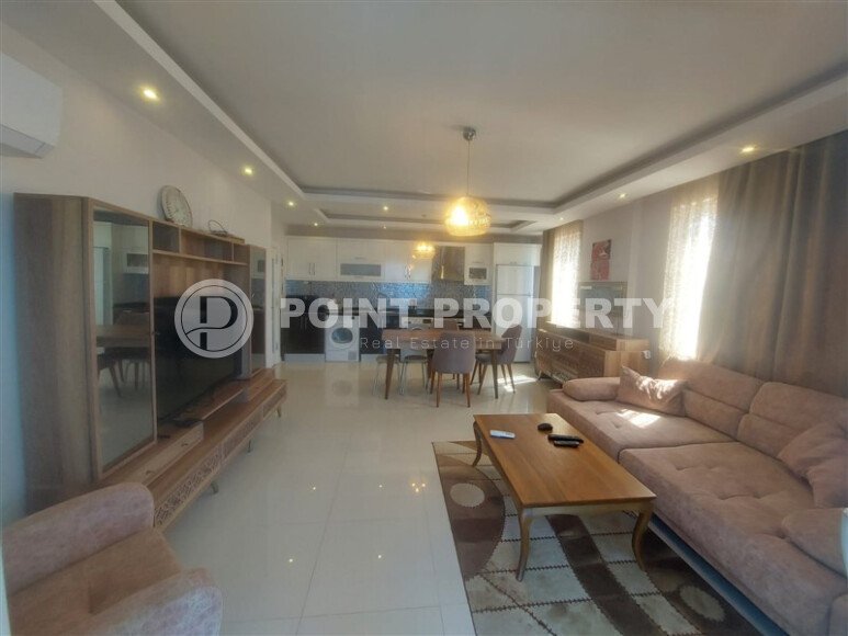 Район Махмутлар. Квартира 2+1, 115 м², 2015 года, до моря 800 м, до центра 500 м, меблирована, с двумя балконами и видом на бассейн.-id-9913-фото-4