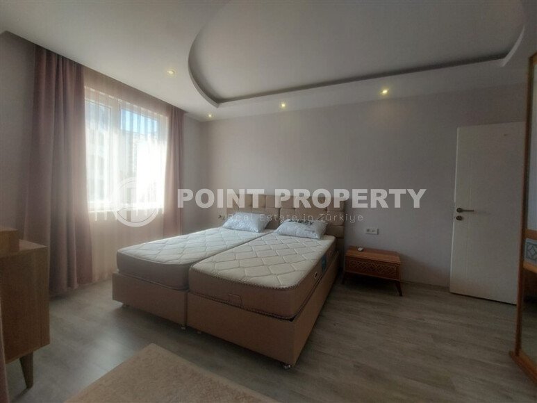 Район Махмутлар. Квартира 2+1, 115 м², 2015 года, до моря 800 м, до центра 500 м, меблирована, с двумя балконами и видом на бассейн.-id-9913-фото-5