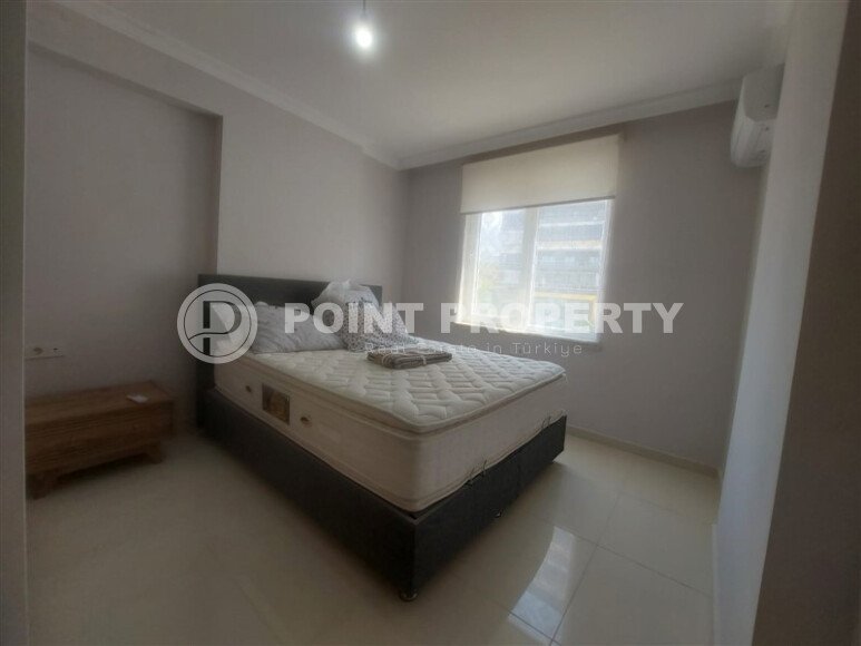 Район Махмутлар. Квартира 2+1, 115 м², 2015 года, до моря 800 м, до центра 500 м, меблирована, с двумя балконами и видом на бассейн.-id-9913-фото-6