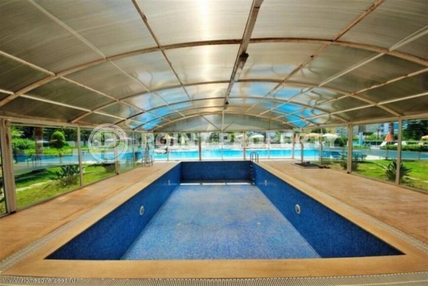 Район Махмутлар. Квартира 2+1, 115 м², 2015 года, до моря 800 м, до центра 500 м, меблирована, с двумя балконами и видом на бассейн.-id-9913-фото-12