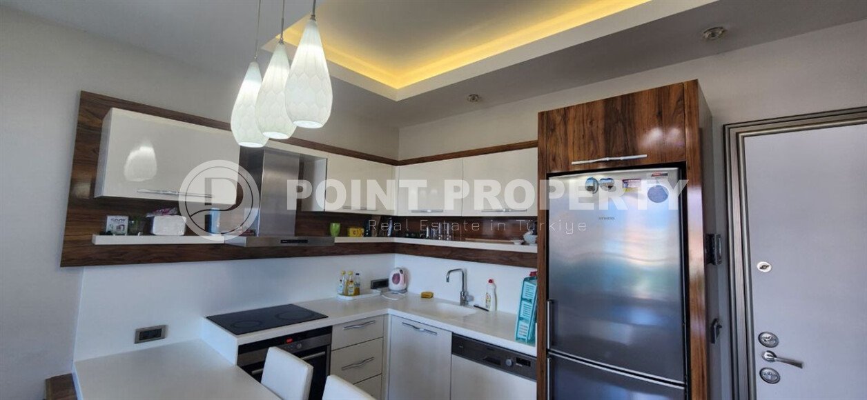 Comfortable 1+1 apartment with mountain and sea views in Mahmutlar – 70 m²-id-9914-photo-1
