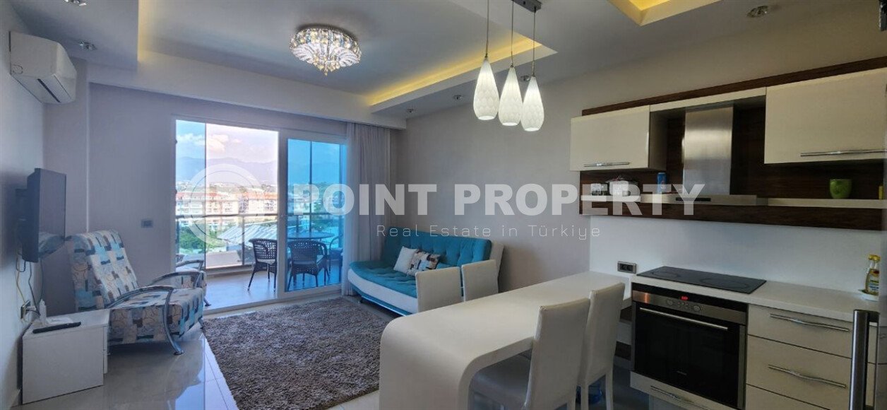 Комфортабельная квартира 1+1 с видами на горы и море в Махмутларе – 70 м²-id-9914-фото-2