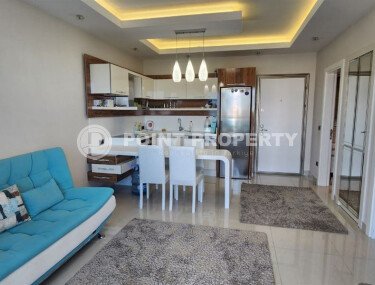 Комфортабельная квартира 1+1 с видами на горы и море в Махмутларе – 70 м²-id-9914-фото-3