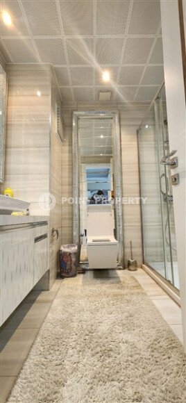 Комфортабельная квартира 1+1 с видами на горы и море в Махмутларе – 70 м²-id-9914-фото-8