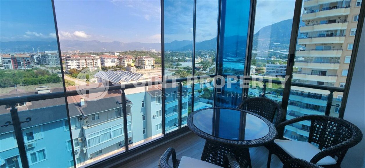 Комфортабельная квартира 1+1 с видами на горы и море в Махмутларе – 70 м²-id-9914-фото-9