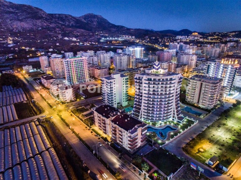 Комфортабельная квартира 1+1 с видами на горы и море в Махмутларе – 70 м²-id-9914-фото-19