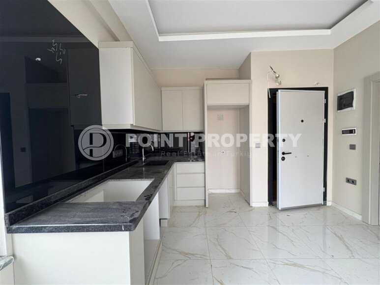 Современная квартира 1+1 площадью 44 м² в Каргыджаке, в красивом жилом комплексе рядом с морем.-id-9920-фото-2