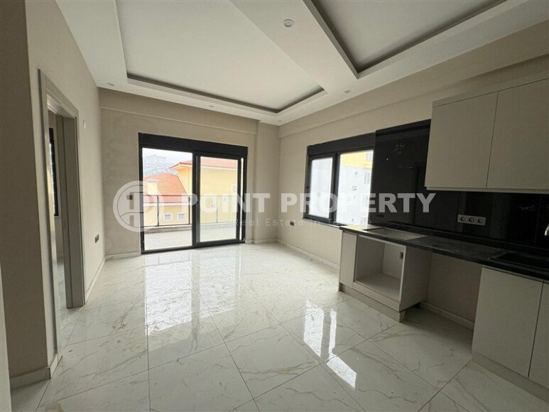 Современная квартира 1+1 площадью 44 м² в Каргыджаке, в красивом жилом комплексе рядом с морем.-id-9920-фото-4