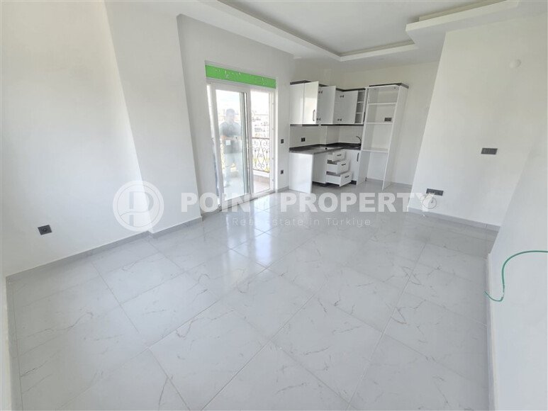 Светлая квартира 1+1 площадью 50 м² с видом на горы в жилом комплексе 2022 года в районе Каргыджак-id-9931-фото-2