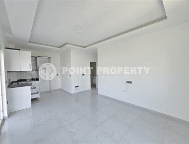 Светлая квартира 1+1 площадью 50 м² с видом на горы в жилом комплексе 2022 года в районе Каргыджак-id-9931-фото-3