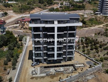 Affordable apartments with installment payment in a residential complex under construction, in a green, environmentally friendly area of Alanya - Demirtas-id-7301-photo-1